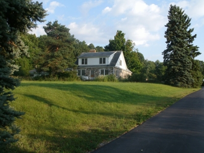 801 W. Coon Lake Rd, Howell, MI- 5BR Home on 40A featured photo
