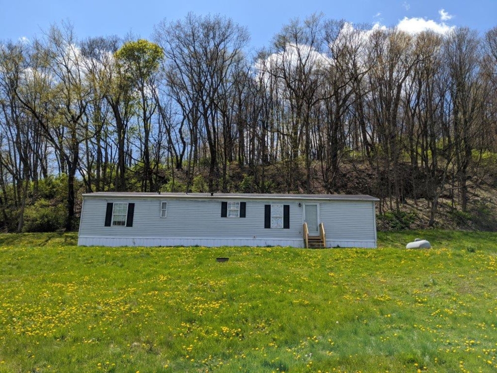 Home & Pole Building on 4 Acres in New Philadelphia featured photo 1