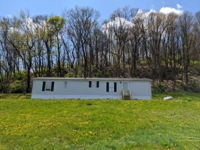 Home & Pole Building on 4 Acres in New Philadelphia featured photo 1