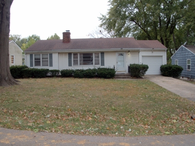 a house with a yard and trees