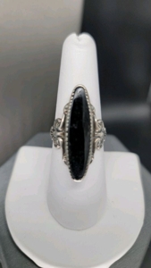 Silver, Gold, Vintage Purses and Books; Military Treasures and so Much More! featured photo