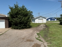 FOR SALE: 2130 N A Street, Wellington KS: 4 Bedrooms, 2 Baths, 2126 sf Brick Home w/48x24 Shed - $177,000 featured photo 5