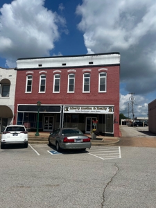 ONLINE AUCTION*HISTORIC COMMERCIAL BUILDING AND PERSONAL PROPERTY IN THE HEART OF DOWNTOWN LEXINGTON TN featured photo