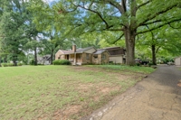 4BR/2BA Collierville home on a prime .91-acre lot featured photo 1